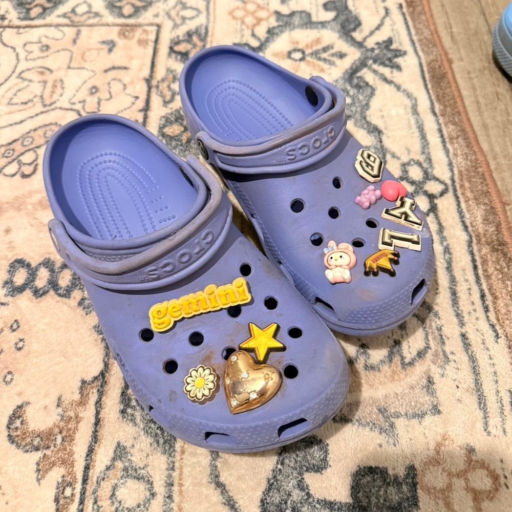 Purple Crocs with cute charms